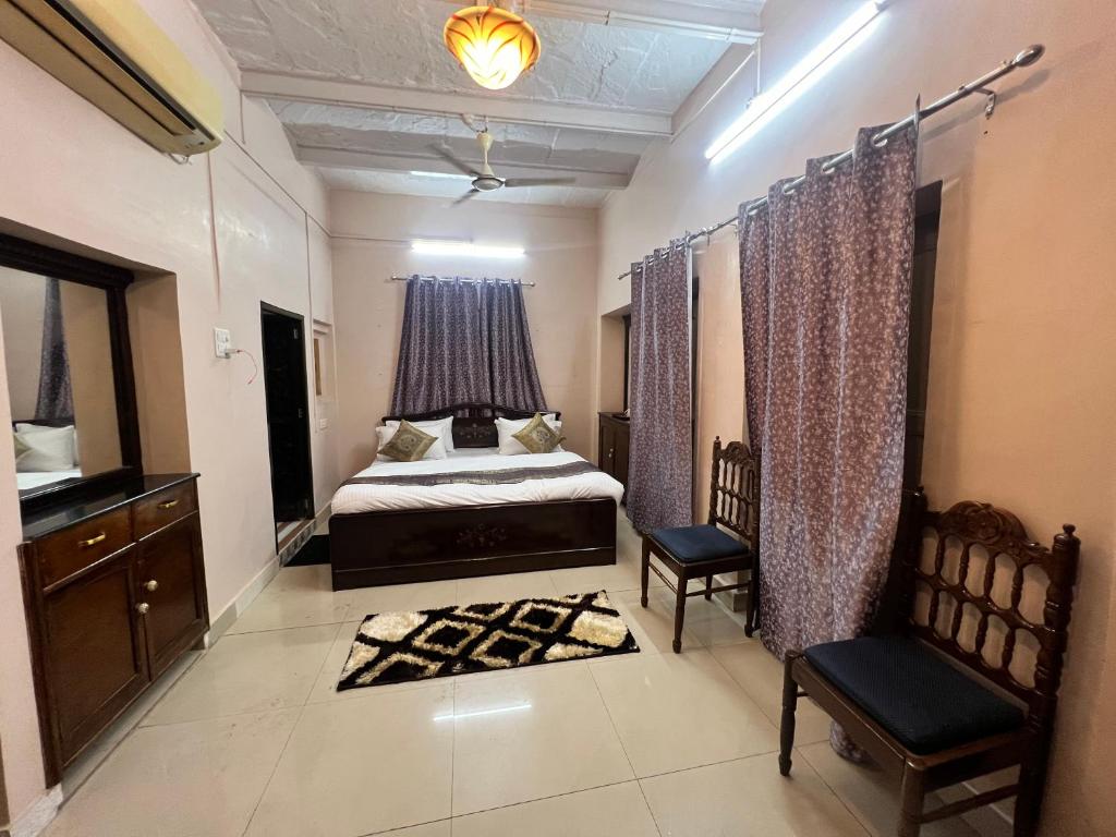 Peaceful bedroom with a neatly arranged bed and ample natural light.